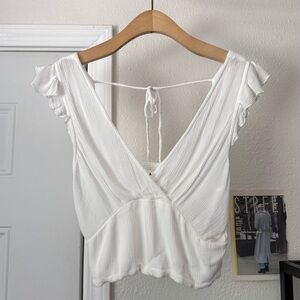 MIRA white viscose gauze surplice tie back ruffle cropped blouse shirt